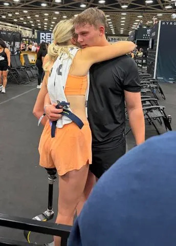 Kennedy Bingham hugging her husband Credit: Kennedy Bingham